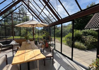 Leverum orangeri foldedør terrasse træ udestue tilbygning landejendom drivadan rasmus jensen arkitekt maa