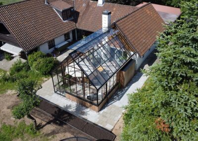 Leverum orangeri foldedør terrasse træ udestue tilbygning landejendom drivadan rasmus jensen arkitekt maa