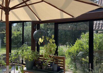 Leverum orangeri foldedør terrasse træ udestue tilbygning landejendom drivadan rasmus jensen arkitekt maa